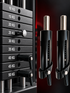 Two automatic drop-set weight stack pins shown on a numbered gym machine weight stack
