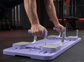 Athlete using purple foldable multifunctional training platform