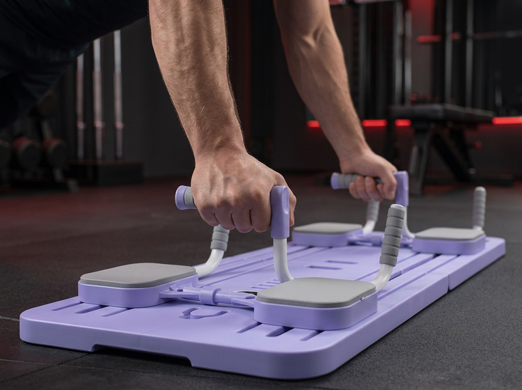 Athlete using purple foldable multifunctional training platform