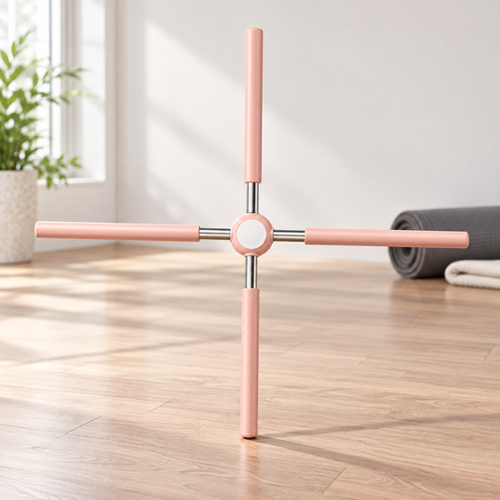 Rose-gold four-arm yoga stretching body stick in a bright home workout space